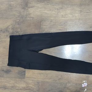 Lulumelon black wunder train high rise tight with pockets 25" size 4 leggings